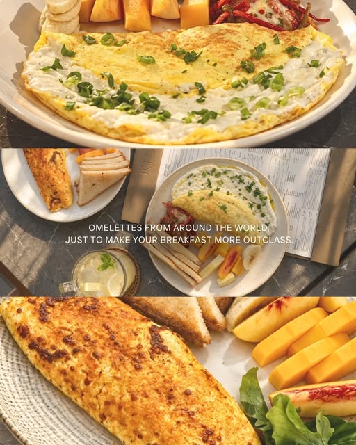 An omelette with scallions and cream cheese, served with fruit